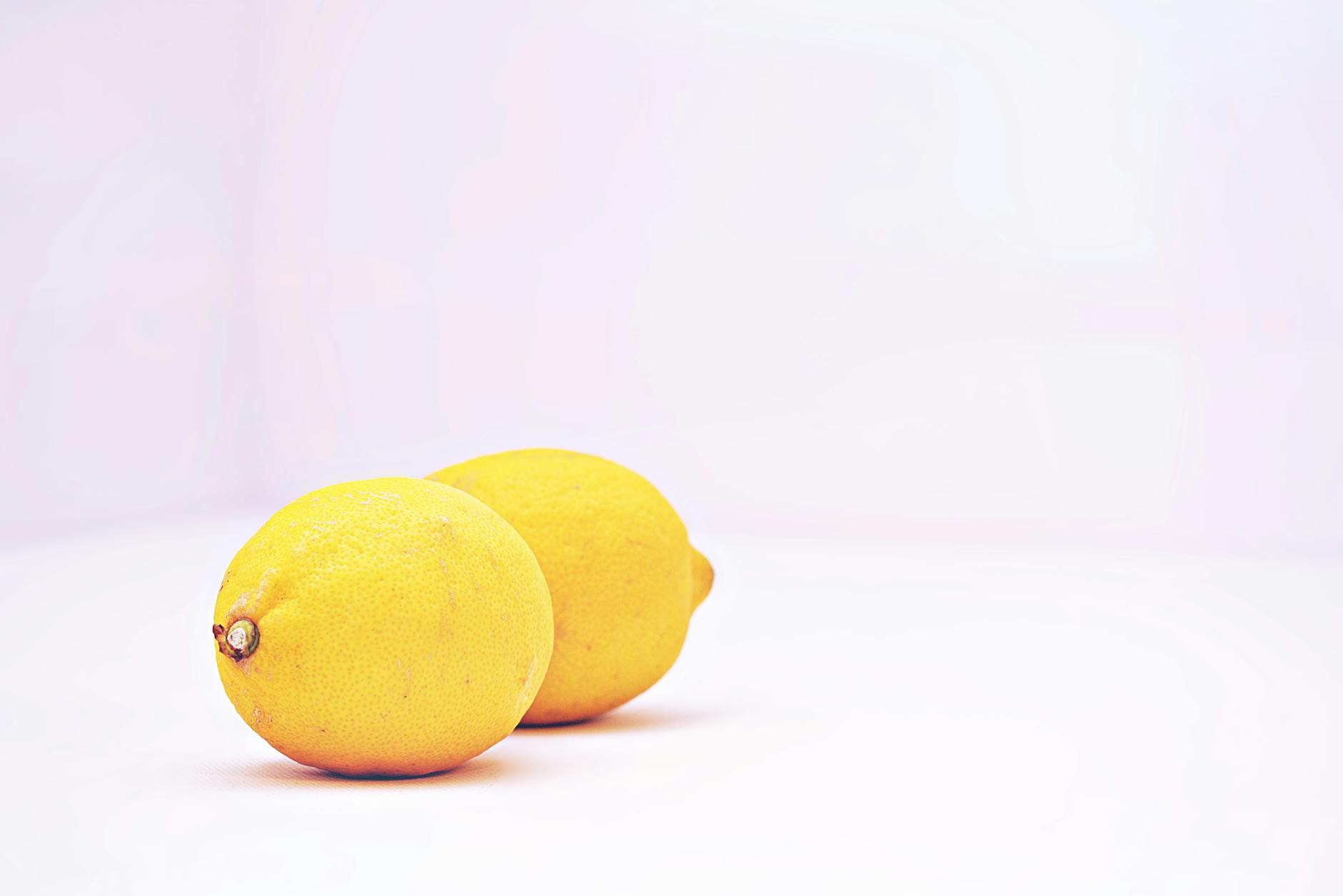 An array of vibrant clitoral vibrators and intimate wellness toys displayed in close-up.